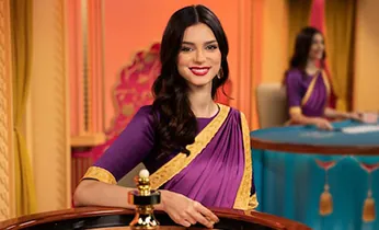 Một người đang tập trung cao độ phân tích dữ liệu trên máy tính bảng và điện thoại di động, thể hiện việc áp dụng chiến lược cá cược nâng cao